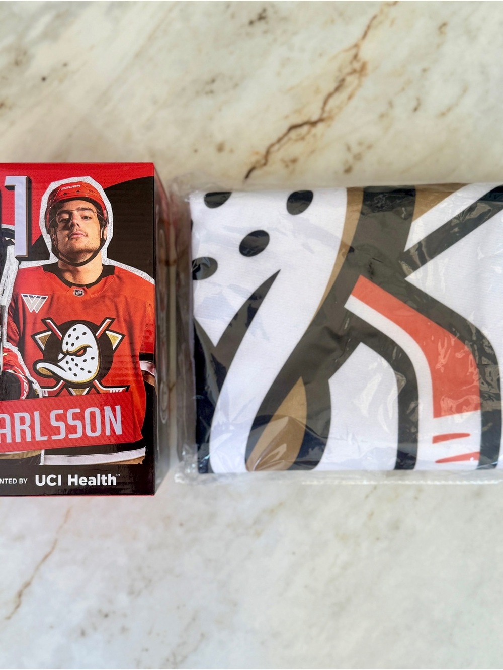 NHL Anaheim Ducks Blanket + Leo Carlsson Anaheim Ducks Figurine Bundle